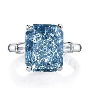 Italo Three Stone Radiant Cut Blue Topaz Engagement Ring